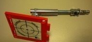 Reflective target with joint and anchor bolt: